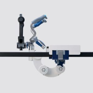 Side view of the Mizuho OSI Levó Head Positioning System attached to the Mizuho OSI Trios Surgical Table System